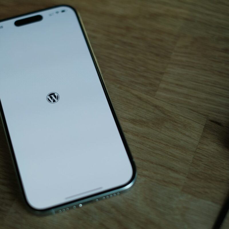 A close up of a cell phone on a table