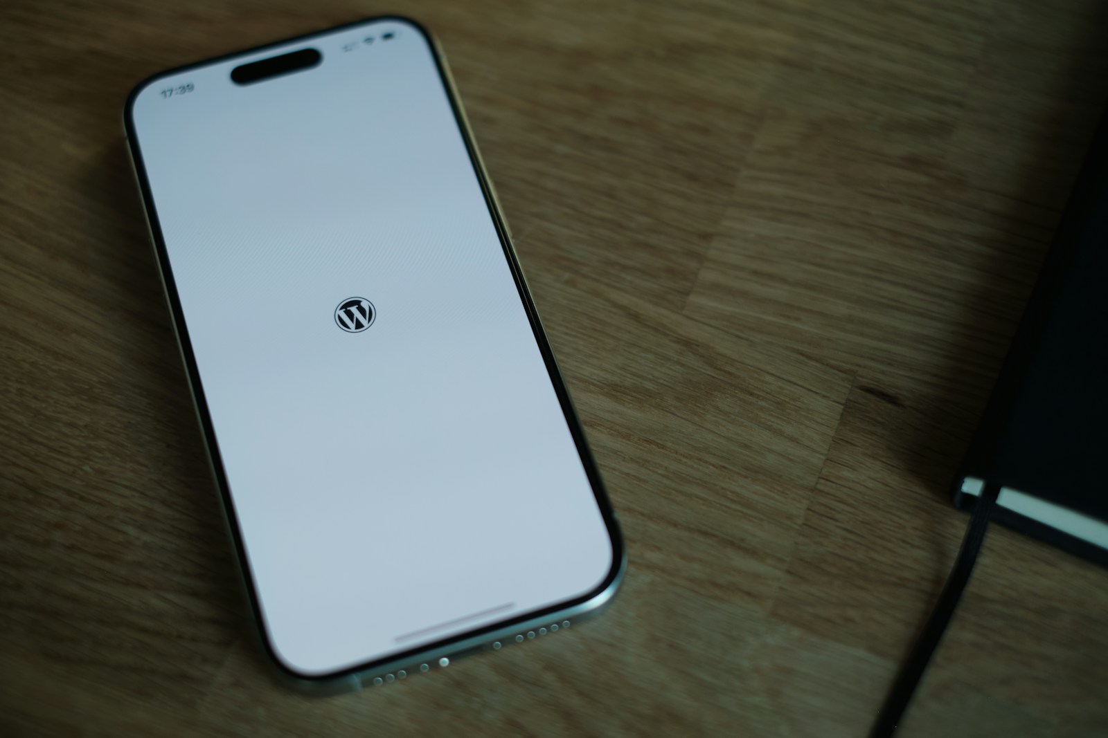 A close up of a cell phone on a table